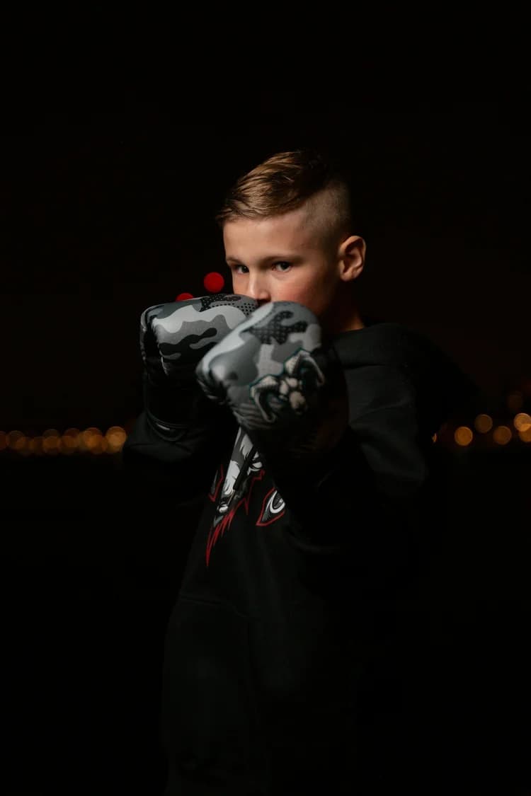 Junior boxer training with focus at Moreno Boxing