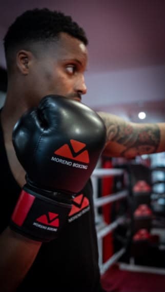Moreno Boxing 14 ounce boxing gloves in the gym