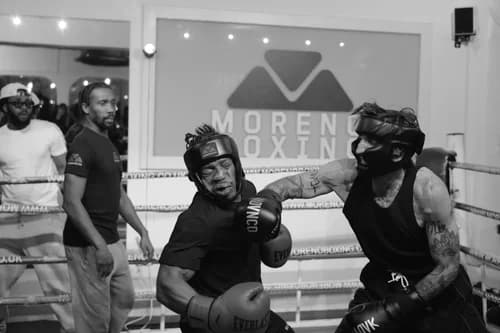 Fight Camp boxer celebrating in the ring at Moreno Boxing